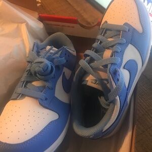 Nike dunks low top… lol crocs… crocs sandals glitter